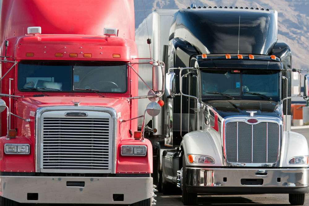 Fleet of Towers & Sons trucks